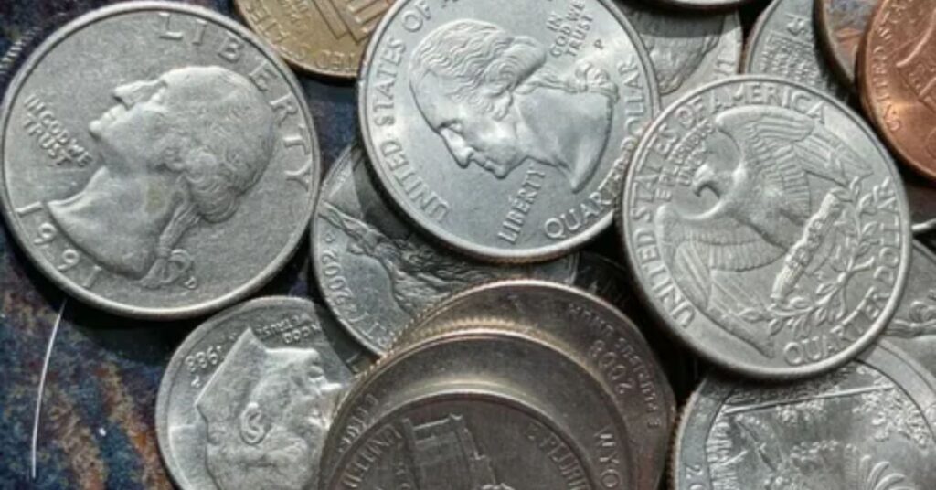Six US Quarters Stacked Together